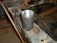 A new hole and a steel pipe will fit the relay on the left hand side of the front crossmember.