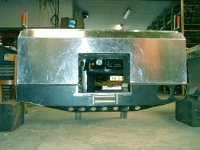 Note: the holes for the right hand side headlights will made next week. We cut them with a CNC machine.