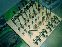 All the bolts, rockershafts and other stuff in order to put them back  in the same order as they came out.