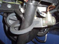 Master brak cilinder with reservoir hoses.