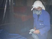 Painting the doors.... charming outfit ;-)